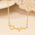Minimalistische gouden hartketting met elegant hartslagpatroon aan een hanger - Goud