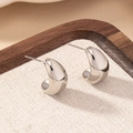 Polished silver bean-shaped C-stud earrings in minimalist drop design for women - Silver