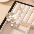 Set gioielli minimalisti in argento con bracciale geometrico vuoto e anello - Argento
