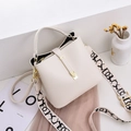 Chic beige bucket bag in pebbled leather with a stylish graffiti woven shoulder strap - Off White