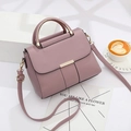 Chic mauve PU leather handbag with gold metal handles and adjustable shoulder strap - Pink