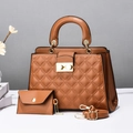 Detail shot of caramel brown quilted handbag set with gold hardware and shoulder strap - Earthy Yellow