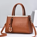 Brown crocodile-embossed PU leather handbag with dual handles and gold metal accents - Brown
