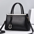 Black crocodile embossed tote bag with gold hardware and adjustable crossbody strap - Black