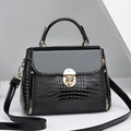 Lizard-texture mini crossbody bag in black faux leather with golden metallic hardware - Black
