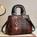 Brown crocodile pattern tote bag with black glossy handles and gold star pendant - Brown