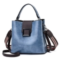 Minimalist colorblock bucket bag in blue and brown leather with dual straps - Blue