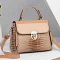 Lizard pattern crossbody bag in beige and khaki finish with metal lock and top handle - Khaki