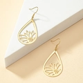 Elegant gold teardrop earrings with hollow sunflower design for a minimalist style - Gold