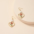 Vintage style drop earrings featuring white pearls and heart-shaped red rose pendants - Gold