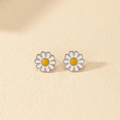 Minimalist white enamel daisy stud earrings with yellow center and silver finish - Daisy Stud Earrings