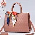 Pink diamond embossed tote bag with colorful silk scarf handle and gold buckle detail - Pink