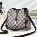 Women's chic contrast monogram canvas bucket bag with premium leather trim and chain charm - M Coffee