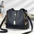 Detail of black bucket bag with gray geometric pattern and golden buckle hardware - Black
