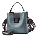 Blue and brown color-block bucket bag with wide striped strap and leather strap - Green