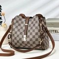 Detail of the high-quality buckle and brown monogram pattern on the bucket bag - Checkered Khaki