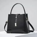 Elegante borsa a secchiello in pizzo nero e pelle con chiusura dorata e tracolla rimovibile - Nero