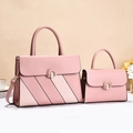 Pink faux leather handbag set with gold arched locks and adjustable shoulder straps - Pink