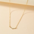 Elegant 18K gold V-shaped necklace featuring sparkling micro-pave cubic zirconia accents - Gold