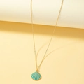 Collar minimalista dorado con colgante de concha en esmalte azul y textura elegante - Dorado