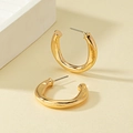 Minimalist chunky C-shape gold-plated alloy hoop earrings with a modern polished finish - Gold