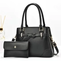 Two-piece black faux leather handbag set with large tote and matching clutch purse - Black
