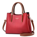 Red leather handbag with fashion queen text gold hardware and brown handles - Burgundy