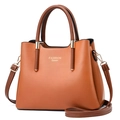 Brown orange faux leather tote bag with gold Fashion Queen text and adjustable strap - Earthy Yellow