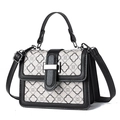 Quilted off-white handbag with clover pattern and black adjustable strap on white background - L20xH15xW9cm