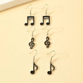 Set di tre paia di orecchini minimalisti in smalto nero a forma di note musicali e argento - Set Argento Nero (3 Paia)