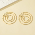 Three pairs of classic gold hoop earrings in small, medium, and large sizes on stone - Set of 3 Sizes / Gold Set