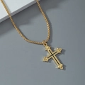 Goldene gotische Kreuzhalskette mit schwarzer Emaileinlage und Box-Kette auf grau - Gold