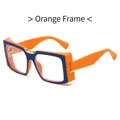 Chic oversized square glasses with orange and blue contrast frame and gold bridge - Orange/Blue
