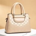 Detail of stone pattern texture and glossy faux leather on light beige tote bag - Plaid Khaki
