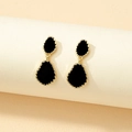 Elegant black enamel teardrop earrings with gold textured edges for women - Black