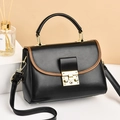 Chic black leather handbag with vintage gold square buckle and adjustable strap - A Black