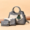Three-piece dark grey hollowed handbag set with floral pattern and pearl accents - Dark Gray