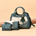 Three-piece women's handbag set in teal and beige with laser-cut floral patterns - Dark Green