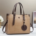 Contrast color leather tote bag with geometric patchwork and adjustable shoulder strap - Khaki