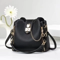 Chic black elephant texture leather bucket bag with golden cat-shaped lock and chain strap - Black