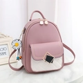 Pink and white quilted small backpack with daisy charm and metal buckle detail - Pink