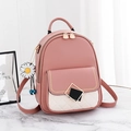 Fashionable pink and beige PU leather backpack for women with daisy pendant and gold hardware - Pink