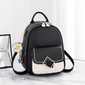 Mochila de moda para mujer en cuero negro con bolsillo acolchado y colgante de margarita - Negro