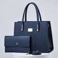 Detail of navy blue textured tote bag set with golden hardware and matching pouch - Blue