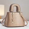 Elegant beige crocodile-embossed handbag with gold hardware and a star-shaped charm - Khaki