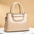 Elegant beige stone pattern tote bag with glossy finish and golden metal hardware - Stone Khaki