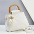 White V-quilted handbag with wooden handles, pearl pom-pom charm and adjustable strap - White