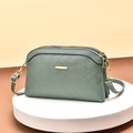 Chic grey-green crossbody bag with quilted lattice pattern and dual gold zippers - Green