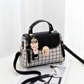 Fashionable black and white plaid handbag with gold lock and cute bear charm pendant - Black Lattice