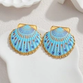 Boucles d'oreilles coquillage dorées 18 carats avec émail bleu clair et pois colorés - Bleu